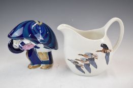 Peter Scott for Midwinter 'Wild Geese' jug and a pottery figure in a snail shell, tallest 15cm