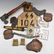 Small collection of WW2 replica Nazi ephemera including ashtrays, grenade, gorget, cigarette case,