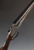 Ugarteburu 12 bore sidelock side by side ejector shotgun with named and engraved locks, engraved top