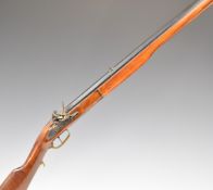 Three decorative flintlock guns with working actions comprising a double barrelled howdah pistol,