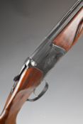 Baikal IJ-27E-1C 12 bore over and under shotgun with engraved lock, chequered semi-pistol grip and