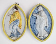 Pair of 19thC oval relief moulded plaques with figural decoration, in the style of Della Robbia,