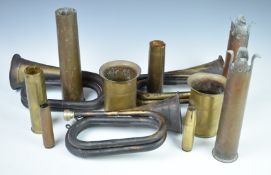 Four pieces of trench art fashioned from brass shell cases, two dated 1917, together with four