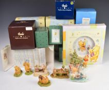 Royal Doulton and Border Fine Arts Winnie The Pooh figures, clock and ceramics, all boxed together