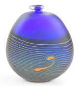 Robert Wynne Denizen glass vase with orange and yellow decoration on blue ground, impressed fire