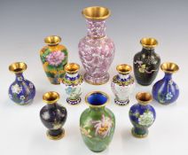 Ten Chinese cloisonné vases including two pairs, tallest 20cm