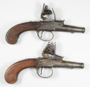 A pair of E Harris of Leicester Queen Anne flintlock pocket pistols, each with named and engraved