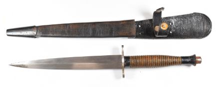 Fairbairn Sykes style fighting knife stamped 2 over 45 and broad arrow, with 18cm blade and