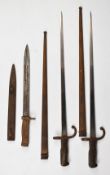 Two French 1874 Gras bayonets, blade lengths 52cm, both with scabbards, one with matching numbers