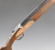 Lincoln 12 bore over and under ejector shotgun with engraved scenes of birds to the sidelock