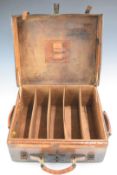 Leather bound oak shotgun cartridge carry case with fitted sectional interior, 36x31x15cm.