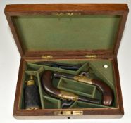 A pair of Thomas Wood percussion hammer action pocket pistols, each with named and engraved brass