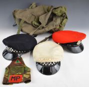Three police caps comprising two Grantham made Metropolitan Police examples, one with a white