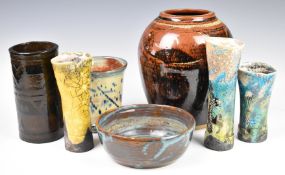 A collection of studio pottery including large vase with indistinct signature, bowl with MB