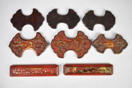 A collection of Chinese 19thC carved and gilded needlework / embroidery winders, largest 15cm