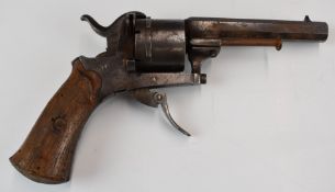 Belgian six-shot pinfire self-cocking revolver with shaped wooden grips, folding trigger and 3