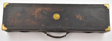 Leather and brass bound double shotgun carry case with 'E W Evans Esqr Alfrick Court' to the brass