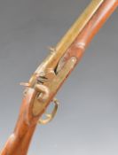 Enfield pattern percussion hammer action carbine with indistinct impressions to the lock, brass