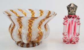 Flash overlaid cranberry cut glass scent bottle with white metal top, together with a shaped