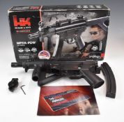 Heckler & Koch MP5K-POW assault style electric airsoft rifle with folding tactical stock, adjustable