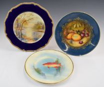 Three cabinet plates including two Royal Worcester examples decorated with Spanish hogfish and