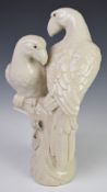 Crackle glazed pottery figure of two parrots in the Chinese style, height 42cm