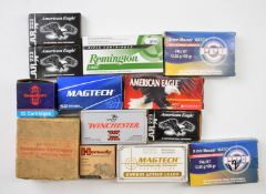 A collection of various shotgun and rifle cartridges including .223 Rem, 8mm Mauser, .38 Spl, .22