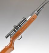 Snow Peak .22 under-lever air rifle with semi-pistol grip, sling mounts and 4x20 scope, serial