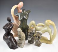 Collection of contemporary African carved soapstone tribal figures, tallest 32cm