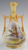 Royal Worcester twin handled pedestal vase decorated with a duck in flight, signed James Stinton,