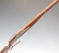 A decorative matchlock style musket with metal fish and other animals inlaid to the stock and 39