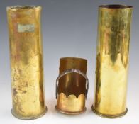 Two WW1 shell cases, both dated 1916 and 26cm tall, together with a trench art coal scuttle dated