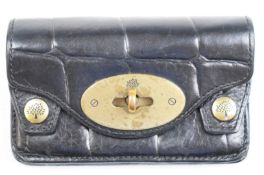 Mulberry ladies purse in black leather with brass fittings