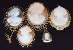 Three 9ct gold brooches each set with cameos and two 9ct gold pendants set with a cameo