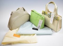 Three Radley handbags comprising Grab Handle, Whisper and Apple Green, all unused with tags and dust