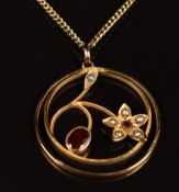 Edwardian 9ct gold pendant set with garnets and seed pearls on 9ct gold chain with barrel clasp, 5.