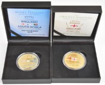 Two cased sporting commemorative gold plated medal coins, one for England vs South Africa Rugby 2019