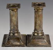 George V pair of hallmarked silver candlesticks formed as reeded columns, Sheffield 1921, maker
