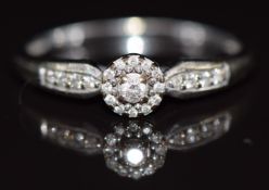 A 9ct white gold ring set with diamonds, 2g, size P