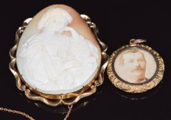 A 9ct gold brooch set with a cameo depicting a woman writing and a c1900 9ct gold locket