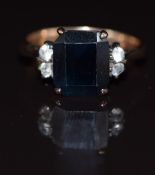 A 9ct gold set with a synthetic sapphire and white sapphires, 4g, size N