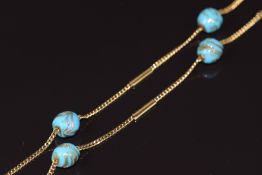 An 18ct gold necklace set with Venetian glass beads, 23.3g
