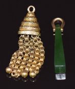 A nephrite jade pendant / seal with 9ct gold loop engraved to base and Victorian 9ct gold tassel