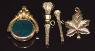 Two Victorian watch keys, Victorian swivel fob and gold plated leaf pendant