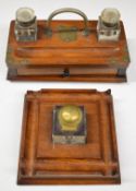 Two 19th or early 20thC desk stands, mounted with cut glass inkwells, width of larger 26cm