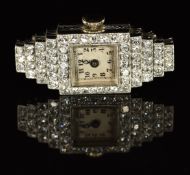 Art Deco diamond set platinum ladies wristwatch with blued Breguet hands, black Arabic numerals,