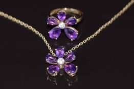 A 9ct gold ring set with amethysts and diamonds, with matching pendant on 9ct gold chain, 6.7g