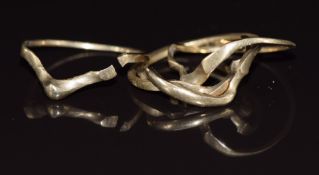 A 9ct gold puzzle ring (one band is broken), 6.4g