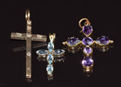 Three 9ct gold pendants in the form of a cross, one set with diamonds, one c1900 set with