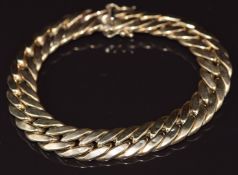 A 9ct gold curb link bracelet, 21g